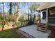 Brick patio with steps leading to a screened porch, perfect for outdoor relaxation at 109 Nelson Ct, Summerville, SC 29485