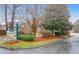 Street view of Newington Gardens Neighborhood showing sign and well-maintained landscape at 109 Nelson Ct, Summerville, SC 29485