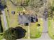 Bird's-eye view of a beautiful residence showcasing its spacious backyard and inviting outdoor living areas at 1115 O T Wallace Blvd, Moncks Corner, SC 29461