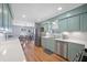 Well-lit kitchen featuring stainless steel appliances, hardwood floors, and subway tile backsplash at 1115 O T Wallace Blvd, Moncks Corner, SC 29461