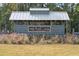 Welcoming sign for the 'Horizons at Summers Corner' community amidst lush, natural surroundings at 1156 Darling St, Summerville, SC 29485