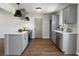 Modern kitchen features sleek gray cabinets and stainless steel appliances at 113 Harter Dr, Summerville, SC 29485