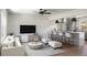 Open-concept living room and kitchen with modern decor and ample seating at 113 Harter Dr, Summerville, SC 29485