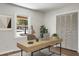 Bright office space featuring a sleek desk, natural light, and closet storage at 113 Harter Dr, Summerville, SC 29485