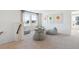 Upstairs loft area with fun décor, comfortable seating, and bright natural light at 117 Moscato Ln, Summerville, SC 29485