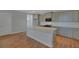 Modern kitchen features an island, stainless appliances, gray cabinets, and bright lighting at 121 Cantona Dr, Summerville, SC 29483