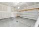 Spacious unfinished two-car garage with concrete floor at 126 Cantona Dr, Summerville, SC 29483