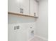 Dedicated laundry room area with white cabinets and connections for appliances at 126 Cantona Dr, Summerville, SC 29483