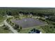 Beautiful aerial view of a serene community featuring a large pond and lush green landscaping at 1329 Wood Sorrel Dr, Moncks Corner, SC 29461