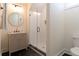 Modern bathroom features black hexagon floors, and glass enclosed shower with geometric wall tiles at 1329 Wood Sorrel Dr, Moncks Corner, SC 29461