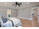 Spacious bedroom with hardwood floors and decorative wall molding at 1329 Wood Sorrel Dr, Moncks Corner, SC 29461
