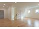 Bright bonus room features hardwood floors, recessed lighting, and shiplap accent wall at 1329 Wood Sorrel Dr, Moncks Corner, SC 29461