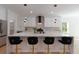 Modern kitchen with white cabinetry, a large island with barstool seating, and pendant lighting at 1329 Wood Sorrel Dr, Moncks Corner, SC 29461