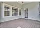 Inviting screened porch with comfortable seating and ample natural light at 1357 Osmond Rd, Mount Pleasant, SC 29466