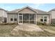 Backyard with screened porch and patio area at 139 Gazania Way, Charleston, SC 29414
