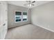 Bedroom with carpet, ceiling fan and view to front of property at 139 Gazania Way, Charleston, SC 29414