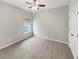 Bedroom with ceiling fan, closet, and window view at 139 Gazania Way, Charleston, SC 29414