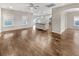 Open floor plan living room and kitchen featuring hard wood floors and recessed lighting at 139 Gazania Way, Charleston, SC 29414