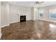 Bright and spacious living room featuring hard wood floors and a fireplace at 139 Gazania Way, Charleston, SC 29414