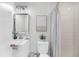 Clean, well-lit bathroom with shower-tub combo, vanity, and decor at 1393 Secessionville Rd, James Island, SC 29412