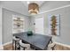 The dining area has a large table with modern chairs and an eye-catching light fixture at 1393 Secessionville Rd, James Island, SC 29412