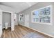 Bright room with lots of windows and access to a half bathroom at 1393 Secessionville Rd, James Island, SC 29412