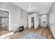 Spacious room with white brick walls, a large rug, and access to a bathroom at 1393 Secessionville Rd, James Island, SC 29412