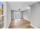 Neutral room featuring a ceiling fan and double doors at 1393 Secessionville Rd, James Island, SC 29412