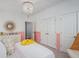 Stylish bedroom design with unique lighting, ample closet space, and bright color accents at 141 Threaded Fern St, Summerville, SC 29485