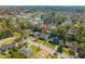 An aerial view of a residential neighborhood with a well-maintained home with mature trees at 1423 Fairfield Ave, Charleston, SC 29407