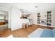 Inviting living room with hardwood floors, fireplace, and stylish built-in shelving at 1423 Fairfield Ave, Charleston, SC 29407