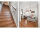 Charming bedroom features wood floors, a decorative chandelier, and a comfortable bed with quilt at 144 St Phillips Row, Summerville, SC 29485