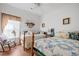 Comfortable bedroom features a pair of twin beds and wood floors at 144 St Phillips Row, Summerville, SC 29485