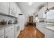 Well-equipped kitchen featuring ample counter space, modern appliances, and dining area access at 144 St Phillips Row, Summerville, SC 29485