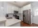 Modern kitchen with stainless steel appliances and white cabinets at 1516 Oldenburg Dr, Mount Pleasant, SC 29466