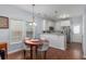 Bright and airy dining area next to kitchen at 1516 Oldenburg Dr, Mount Pleasant, SC 29466