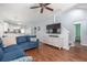Comfortable living room featuring hardwood floors, a ceiling fan, and an open layout at 1516 Oldenburg Dr, Mount Pleasant, SC 29466