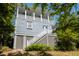 Attractive two-story home featuring a convenient stair entrance, offering easy access to the upper level at 1543 Wando Landing St, Charleston, SC 29492
