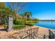 Scenic lakeside view with brick path and stairs leading to the serene water's edge at 1543 Wando Landing St, Charleston, SC 29492