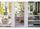 Outdoor patio area features a dining table, chairs, and stylish decor at 1543 Wando Landing St, Charleston, SC 29492