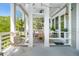 Outdoor living space with comfortable seating, dining area, and tranquil views at 1543 Wando Landing St, Charleston, SC 29492