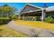 Inviting outdoor pavilion with ample seating and lush landscaping offers a relaxing retreat at 1543 Wando Landing St, Charleston, SC 29492
