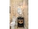 Chic powder room with decorative wallpaper, stylish vanity, and modern toilet at 1543 Wando Landing St, Charleston, SC 29492