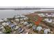 Stunning aerial view of a charming waterfront community with beautiful homes at 1543 Wando Landing St, Charleston, SC 29492
