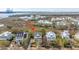 Street view of a beautiful home nestled in a vibrant neighborhood near the water at 1543 Wando Landing St, Charleston, SC 29492