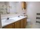 Bathroom with a double sink vanity and a seashell themed shower curtain at 16 Baldwin Ln, Green Pond, SC 29446