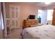 Cozy bedroom with a view into the living room and kitchen from the doorway at 16 Baldwin Ln, Green Pond, SC 29446