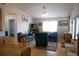 Bright living room with hardwood floors, comfortable seating, and natural light at 16 Baldwin Ln, Green Pond, SC 29446