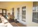 Inviting porch with a seating area and entryway at 16 Baldwin Ln, Green Pond, SC 29446
