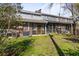 A beautiful backyard view of the home featuring a patio and green space at 1713 Boone Hall Dr # I9, Charleston, SC 29407